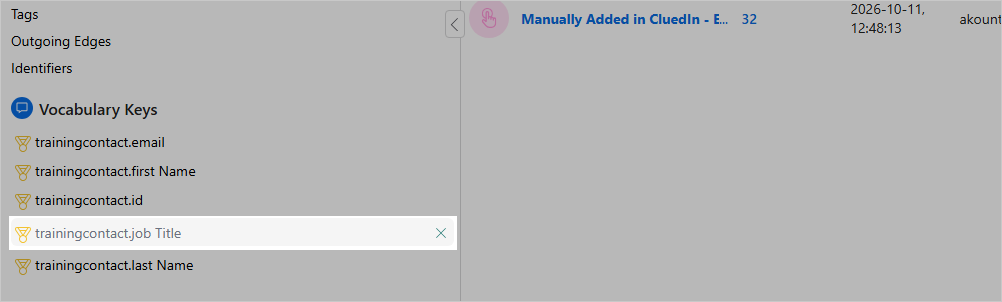 The Vocabulary Keys list on the filters pane with trainingcontact.job Title selected, each key marked with a medal icon
